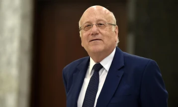 Lebanon names billionaire businessman as PM to tackle economic woes