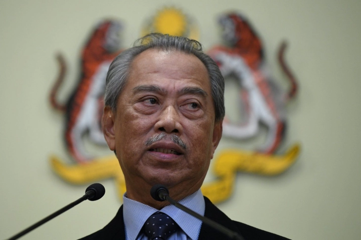 Malaysian PM quits and accuses rivals of pandemic power-grab
