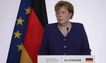 Merkel warns of 'difficult weeks' ahead, urges more vaccinations