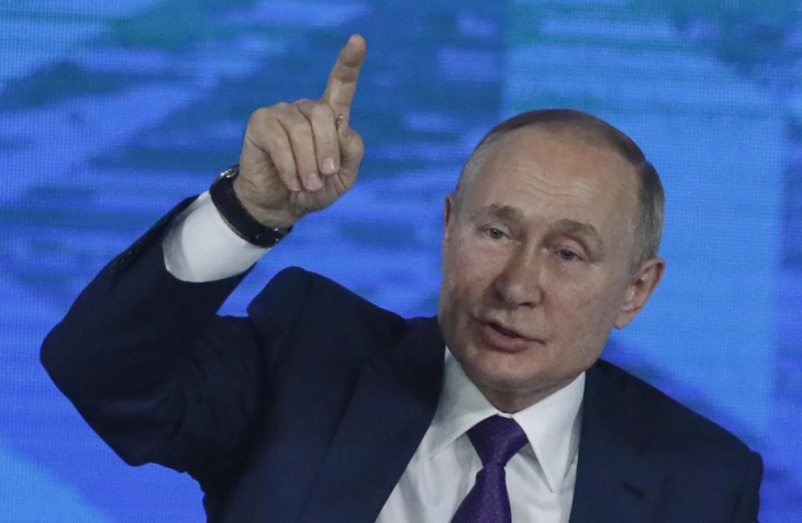 Russia's Putin chides NATO for expansion, asks for Navalny evidence
