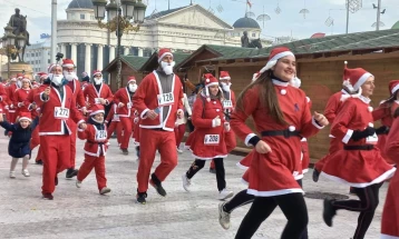 People dressed as Santa raced in Skopje after year-long hiatus