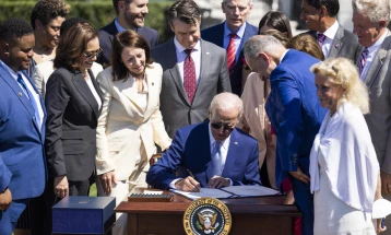 Biden signs semiconductor bill as businesses boost investment