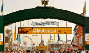 Long queues, chilly drizzle, mark return of Oktoberfest to Munich