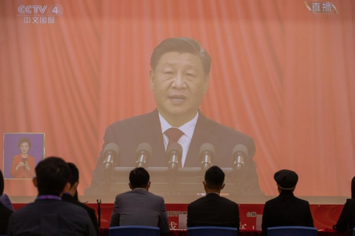 Xi warns of 'dangerous storms' as he opens party congress