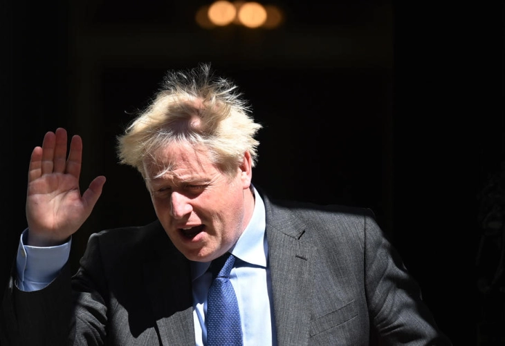 Johnson returns to Britain as party split on expected leadership bid