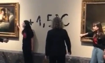 Two climate activists glue themselves to Goya paintings in Madrid
