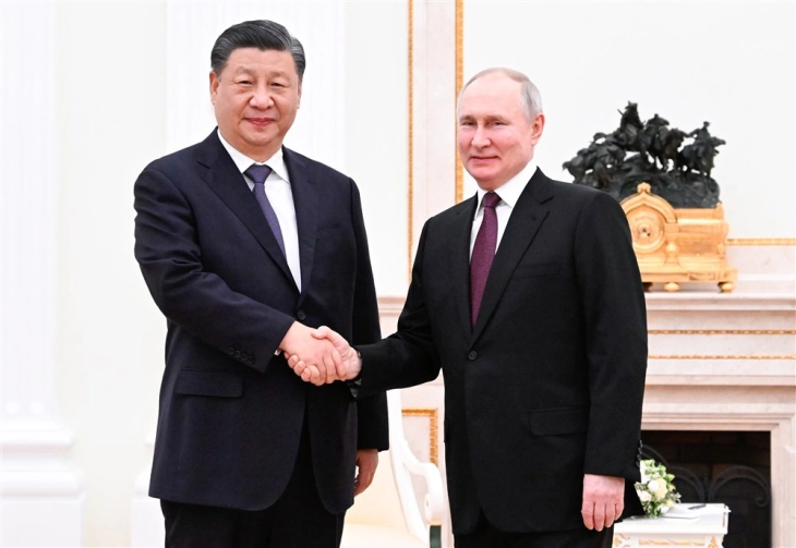 Putin tells China its supply of Russian energy is secure
