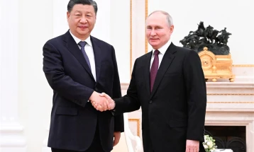 Putin tells China its supply of Russian energy is secure