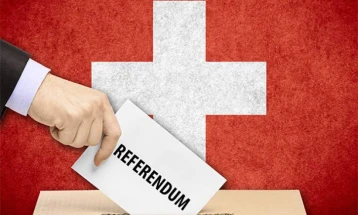 Swiss vote for climate protection and higher taxes in referendum