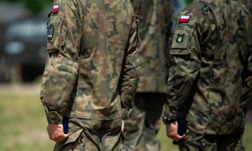 Poland sending more troops to border with Belarus