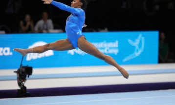 Biles becomes most decorated gymnast ever with all-around world title
