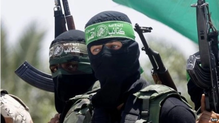 Hamas threatens to kill hostages, as Israel says Gaza border secured