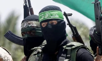 Hamas threatens to kill hostages, as Israel says Gaza border secured