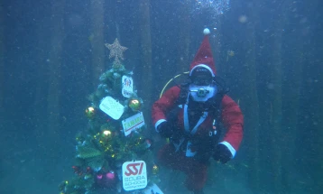 Divers decorate Christmas tree underwater in Ohrid Lake