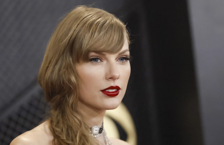 Swift becomes first to win album of the year four times at Grammys