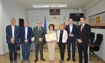 SEC presents Gordana Siljanovska-Davkova with certificate of election