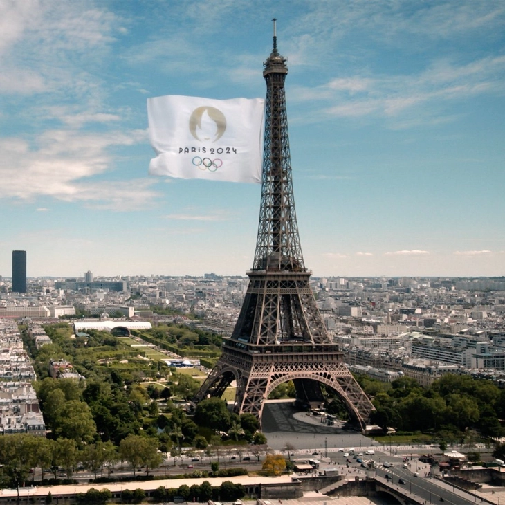 Olympic rings on Eiffel Tower unveiled 50 days ahead of Paris Games