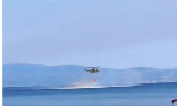 Serbia's Airbus Super Puma H215 helicopter putting out Ohrid fire