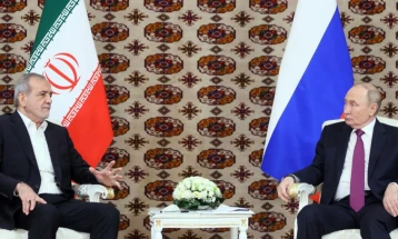 Putin hails bilateral ties at first meeting with Iranian president