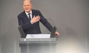 Germany's Scholz 'very happy' about agreement on February 23 election