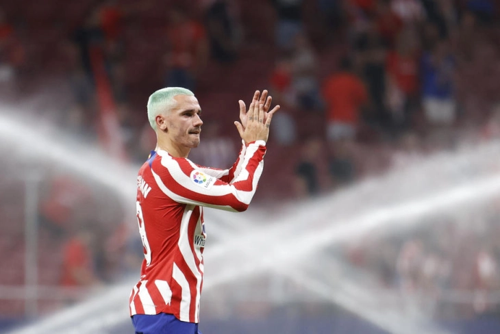 Griezmann earns Atletico last-gasp win over Sevilla, Lazio joy