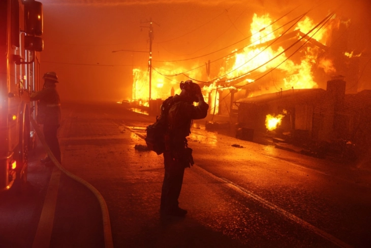 At least 10 confirmed dead as Los Angeles wildfires rage on