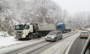 Wet and slushy roads, truck bans on several routes