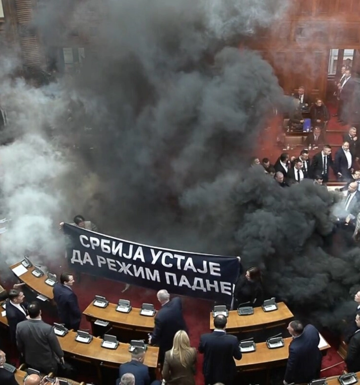 Serbian opposition lawmakers set off flares in parliament