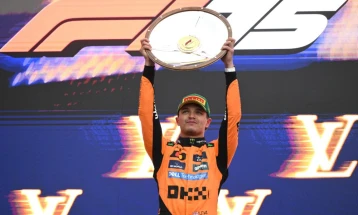 Lando Norris holds off Verstappen to win wet Australian Grand Prix