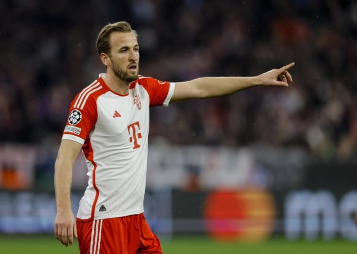 Kane makes it 100 goals for scoring record as Bayern remain perfect