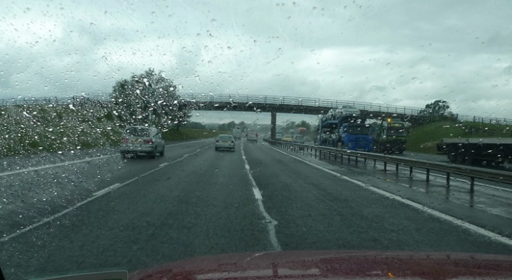 Traffic: Partly wet roads, no border delays
