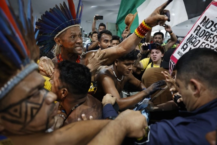Indigenous activists storm UN climate summit site in Brazil