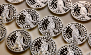 Фреди Меркјури на колекционерски монети од британската Кралска ковница