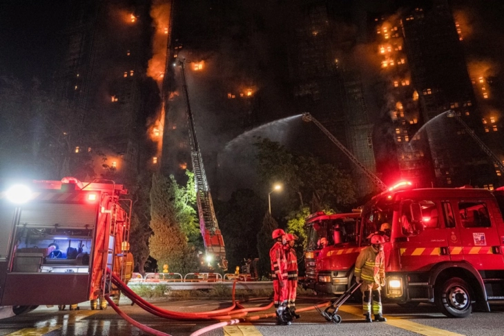 At least 13 dead as major fire engulfs tower blocks in Hong Kong