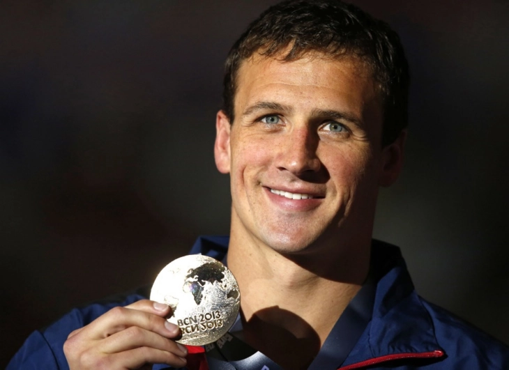 Лохте продаде три златно олимписки медали на аукциа