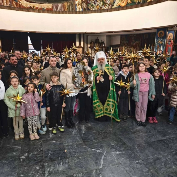 Carolers meet Archbishop Stefan at St. Clement of Ohrid church