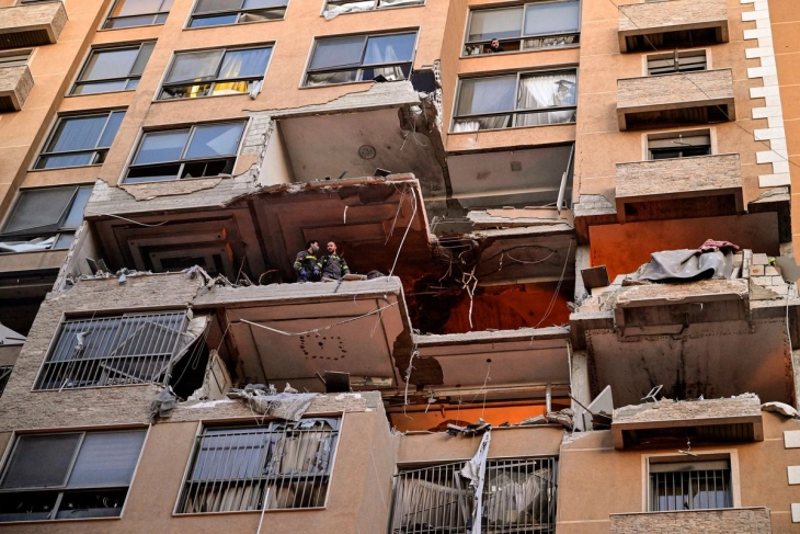 Israel says it struck dozens of Hezbollah positions in Lebanon