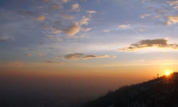 Weather: Sunny with scattered clouds; high 20°C