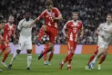 Bayern claim crucial win at Madrid, Arsenal beat Sporting