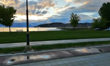 Weather: Partly cloudy with local rain